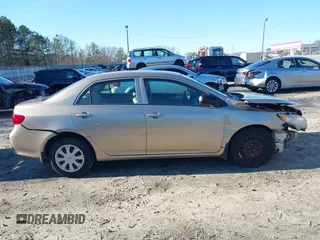2009 Toyota Corolla with VIN 1NXBU40EX9Z049143, listed as a IAAI auction lot 41596503 with 94,255 mi miles. Bid and sale history available at carsss.com. Image 13.