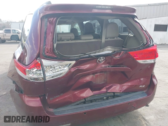 2014 Toyota Sienna XLE with VIN 5TDYK3DCXES442968, listed as a IAAI auction lot 41241310 with 132,020 mi miles and . Bid and sale history available at DreamBid. Image 6.