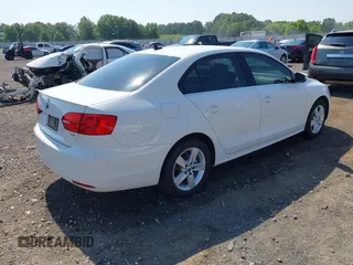 2014 Volkswagen Jetta TDI w/Premium/Nav with VIN 3VWLL7AJXEM366828, listed as a IAAI auction lot 42392563 with 132,924 mi miles and . Bid and sale history available at DreamBid. Image 4.