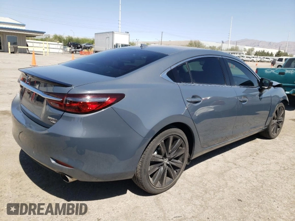 2021 Mazda 6 Grand Touring Reserve with VIN JM1GL1WY4M1617118, listed as a Copart auction lot 54951114 with 14,670 mi miles and Salvage Title. Bid and sale history available at DreamBid. Image 3.
