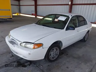1997 Ford Escort LX with VIN 1FALP13P4VW151666, listed as a IAAI auction lot 42493330 with 321,304 mi miles and . Bid and sale history available at DreamBid. Image 2.