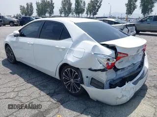 2014 Toyota Corolla L with VIN 5YFBURHE1EP063722, listed as a IAAI auction lot 42161425 with 148,227 mi miles and . Bid and sale history available at DreamBid. Image 3.