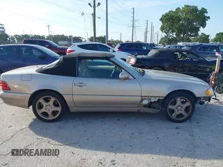 2000 Mercedes-Benz SL 500 z VIN WDBFA68F6YF194611, wystawiony jako IAAI lot #42362699 z przebiegiem 120 647 mil mil oraz . Historia ofert i sprzedaży dostępna na DreamBid. Obrazek 14.