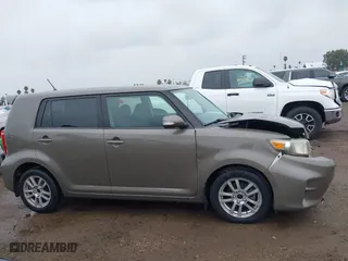 2011 Scion xB with VIN JTLZE4FE9B1141752, listed as a IAAI auction lot 41797088 with 114,357 mi miles. Bid and sale history available at carsss.com. Image 14.