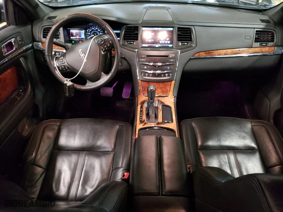 2014 Lincoln MKS with VIN 1LNHL9EK4EG606050, listed as a Copart auction lot 53412495 with 213,371 mi miles and Clean Title. Bid and sale history available at carsss.com. Image 8.