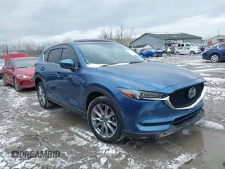 2020 Mazda CX-5 Grand Touring with VIN JM3KFBDM2L0778831, listed as a IAAI auction lot 41739655 with 72,533 mi miles. Bid and sale history available at carsss.com. Image 1.