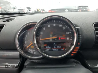 2016 MINI Clubman z VIN WMWLN5C58G2E30988, wystawiony jako Copart lot #48992025 z przebiegiem 108 620 mil mil oraz Czysty tytuł • Clean title. Historia ofert i sprzedaży dostępna na DreamBid. Obrazek 9.