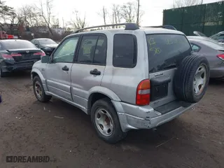 2002 Suzuki Grand Vitara JLX with VIN JS3TD62V724153257, listed as a IAAI auction lot 41452635 with 999,999 mi miles. Bid and sale history available at carsss.com. Image 3.