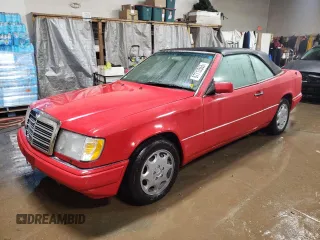 1994 Mercedes-Benz E 320 with VIN WDBEA66E8RC044069, listed as a Copart auction lot 87713565 with 69,061 mi miles and Salvage Title. Bid and sale history available at DreamBid. Image 1.