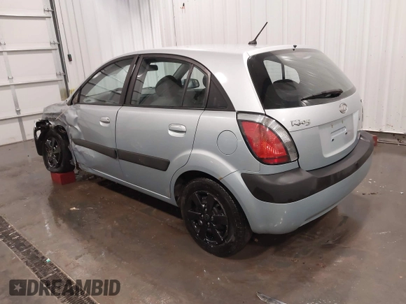 2008 Kia Rio LX with VIN KNADE163186345215, listed as a IAAI auction lot 41776000 with 141,859 mi miles. Bid and sale history available at carsss.com. Image 3.