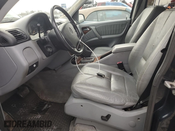 2002 Mercedes-Benz M-Class with VIN 4JGAB54E62A292019, listed as a Copart auction lot 81493604 with 305,098 mi miles and Salvage Title. Bid and sale history available at carsss.com. Image 7.
