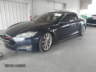2014 Tesla Model S 60 с VIN 5YJSA1H11EFP60357, выставлен на аукционе IAAI как лот 42656130 с пробегом 133 344 миль миль и . История ставок и продаж доступна на DreamBid. Изображение 2.