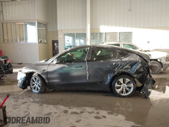 2023 Tesla Model Y Long Range with VIN 7SAYGDEE5PA033341, listed as a IAAI auction lot 41379625 with Not provided miles and . Bid and sale history available at DreamBid. Image 14.