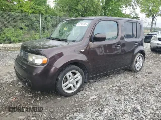 2009 Nissan Cube S z VIN JN8AZ28R39T105396, wystawiony jako Copart lot #57292795 z przebiegiem 94 536 mil mil oraz Tytuł czysty. Historia ofert i sprzedaży dostępna na DreamBid. Obrazek 1.