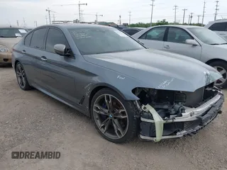 2018 BMW 5 Series M550i xDrive z VIN WBAJB9C55JB035694, wystawiony jako IAAI lot #42122730 z przebiegiem 61 561 mil mil oraz . Historia ofert i sprzedaży dostępna na DreamBid. Obrazek 1.