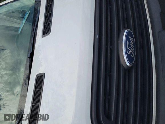 2019 Ford Transit z VIN 1FTYE1YM9KKA69150, wystawiony jako IAAI lot #42723249 z przebiegiem 226 890 mil mil oraz . Historia ofert i sprzedaży dostępna na DreamBid. Obrazek 26.
