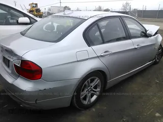 2008 BMW 3 Series 328i with VIN WBAVC53508FZ82765, listed as a IAAI auction lot 22177889 with 111,442 mi miles. Bid and sale history available at carsss.com. Image 4.