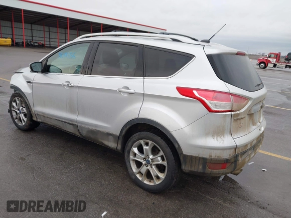 2015 Ford Escape Titanium with VIN 1FMCU9J97FUA84589, listed as a IAAI auction lot 41688156 with 129,073 mi miles. Bid and sale history available at carsss.com. Image 3.