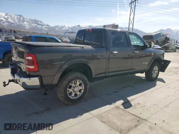 2020 Ram 2500 Laramie with VIN 3C6UR5FL6LG122309, listed as a Copart auction lot 48019295 with 57,352 mi miles and Salvage Title. Bid and sale history available at carsss.com. Image 3.