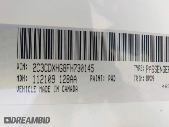 2015 Dodge Charger SXT with VIN 2C3CDXHG8FH730145, listed as a IAAI auction lot 42039927 with 156,135 mi miles and . Bid and sale history available at DreamBid. Image 9.