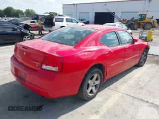 2010 Dodge Charger SXT with VIN 2B3CA3CV7AH302306, listed as a IAAI auction lot 42105542 with 83,313 mi miles and . Bid and sale history available at carsss.com. Image 4.