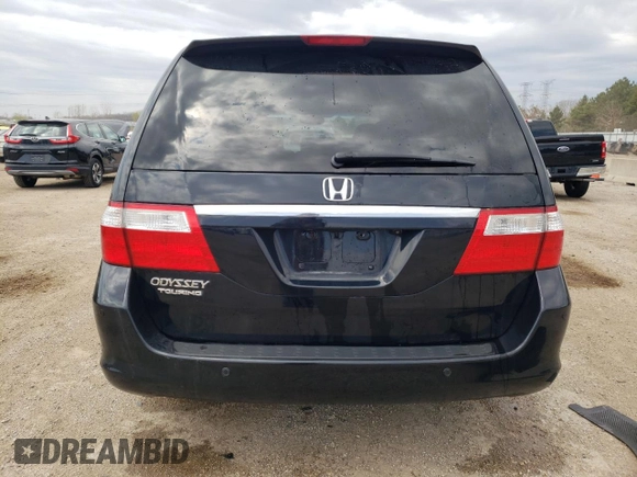 2007 Honda Odyssey Touring with VIN 5FNRL38847B022928, listed as a Copart auction lot 53869135 with 217,620 mi miles and Salvage Title. Bid and sale history available at DreamBid. Image 6.