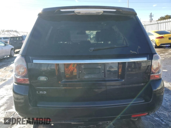 2014 Land Rover LR2 z VIN SALFR2BG7EH418479, wystawiony jako Copart lot #42394775 z przebiegiem 74 247 mil mil oraz Szkoda całkowita • Salvage title. Historia ofert i sprzedaży dostępna na DreamBid. Obrazek 6.