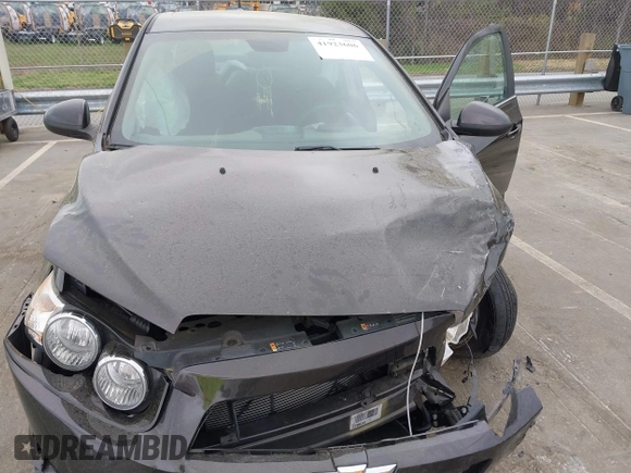 2013 Chevrolet Sonic LT with VIN 1G1JC5SH9D4193932, listed as a IAAI auction lot 41923606 with 132,339 mi miles and . Bid and sale history available at DreamBid. Image 6.