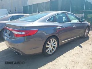 2012 Hyundai Azera with VIN KMHFH4JGXCA174819, listed as a IAAI auction lot 42579424 with 160,896 mi miles and . Bid and sale history available at DreamBid. Image 4.