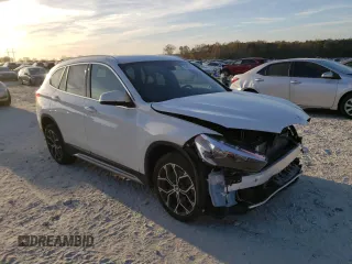 2020 BMW X1 xDrive28i with VIN WBXJG9C02L3L57542, listed as a Copart auction lot 67003112 with 18,619 mi miles. Bid and sale history available at carsss.com. Image 1.