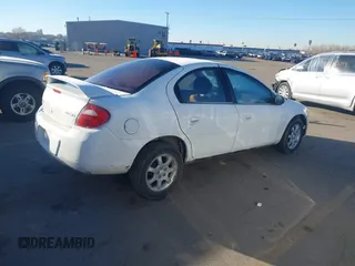 2004 Dodge Neon SXT with VIN 1B3ES56C34D502063, listed as a IAAI auction lot 41666931 with 227,531 mi miles. Bid and sale history available at carsss.com. Image 4.