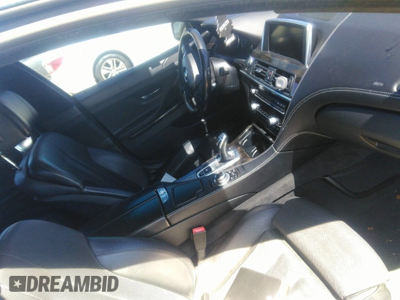 2014 BMW 6 Series 640i z VIN WBA6A0C57EDZ04682, wystawiony jako IAAI lot #41891362 z przebiegiem 140 478 mil mil oraz . Historia ofert i sprzedaży dostępna na DreamBid. Obrazek 5.