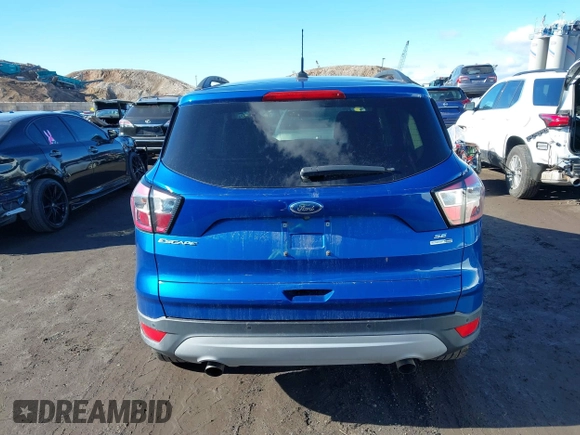 2017 Ford Escape SE with VIN 1FMCU9G91HUE28282, listed as a IAAI auction lot 41471957 with 23,552 mi miles. Bid and sale history available at carsss.com. Image 16.