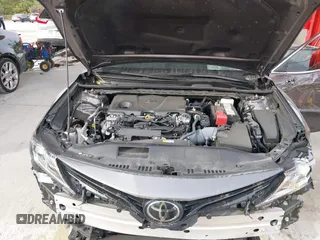 2023 Toyota Camry LE z VIN 4T1C11AK3PU719452, wystawiony jako IAAI lot #38236100 z przebiegiem 34 140 mil mil oraz . Historia ofert i sprzedaży dostępna na DreamBid. Obrazek 10.