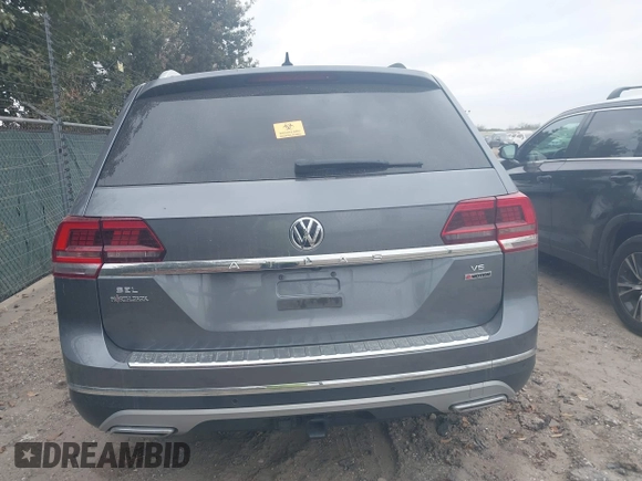 2019 Volkswagen Atlas SEL with VIN 1V2MR2CAXKC606820, listed as a IAAI auction lot 41174864 with 157,416 mi miles and . Bid and sale history available at DreamBid. Image 16.