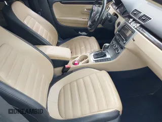 2014 Volkswagen CC Executive z VIN WVWGU7ANXEE507486, wystawiony jako IAAI lot #41943516 z przebiegiem 148 796 mil mil oraz . Historia ofert i sprzedaży dostępna na DreamBid. Obrazek 5.