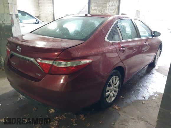 2015 Toyota Camry XLE with VIN 4T1BF1FK8FU932854, listed as a IAAI auction lot 41872099 with Not Provided miles and . Bid and sale history available at DreamBid. Image 4.