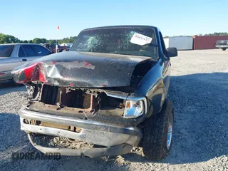 1994 Ford Ranger Splash z VIN 1FTCR14X0RPB45012, wystawiony jako IAAI lot #42033127 z przebiegiem 335 097 mil mil oraz . Historia ofert i sprzedaży dostępna na DreamBid. Obrazek 6.