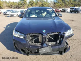 2022 BMW X4 M40i with VIN 5UX43DT02N9K31818, listed as a Copart auction lot 38495943 with 12,673 mi miles. Bid and sale history available at carsss.com. Image 5.