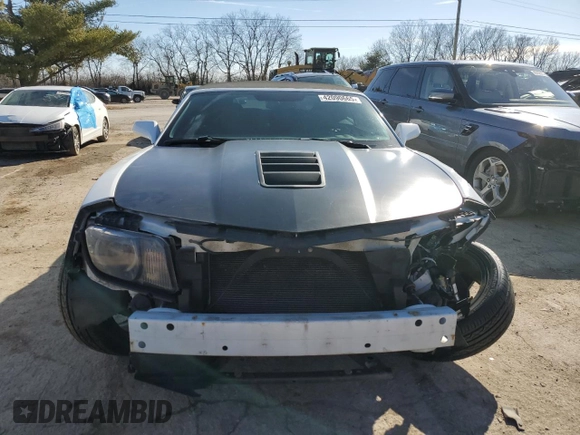 2013 Chevrolet Camaro LT z VIN 2G1FC3D30D9217897, wystawiony jako Copart lot #42090665 z przebiegiem 132 813 mil mil oraz Szkoda całkowita • Salvage title. Historia ofert i sprzedaży dostępna na DreamBid. Obrazek 5.