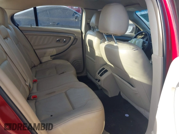 2014 Ford Taurus SEL with VIN 1FAHP2E80EG159131, listed as a IAAI auction lot 42004296 with 140,213 mi miles and . Bid and sale history available at DreamBid. Image 8.