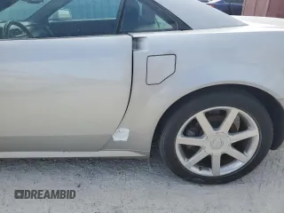 2004 Cadillac XLR z VIN 1G6YV34A945601007, wystawiony jako Copart lot #77077394 z przebiegiem Nie podano mil oraz Szkody całkowita. Historia ofert i sprzedaży dostępna na DreamBid. Obrazek 12.