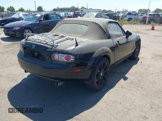 2006 Mazda MX-5 Miata Sport with VIN JM1NC25F860115878, listed as a IAAI auction lot 42842757 with 81,777 mi miles and . Bid and sale history available at DreamBid. Image 4.