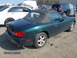 1999 Mazda MX-5 Miata with VIN JM1NB3537X0109618, listed as a IAAI auction lot 41795736 with 160,452 mi miles and . Bid and sale history available at DreamBid. Image 4.