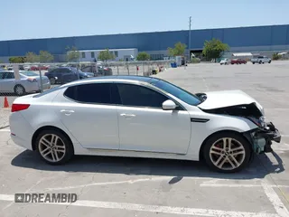 2013 Kia Optima SX with VIN 5XXGR4A6XDG106409, listed as a IAAI auction lot 42525630 with 213,722 mi miles and . Bid and sale history available at DreamBid. Image 14.
