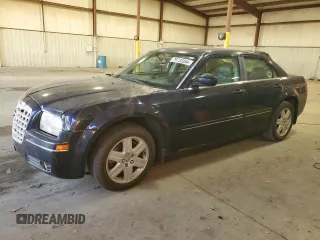2005 Chrysler 300 z VIN 2C3AK53G65H644016, wystawiony jako Copart lot #79733354 z przebiegiem Nie podano mil oraz Szkoda całkowita • Salvage title. Historia ofert i sprzedaży dostępna na DreamBid. Obrazek 1.