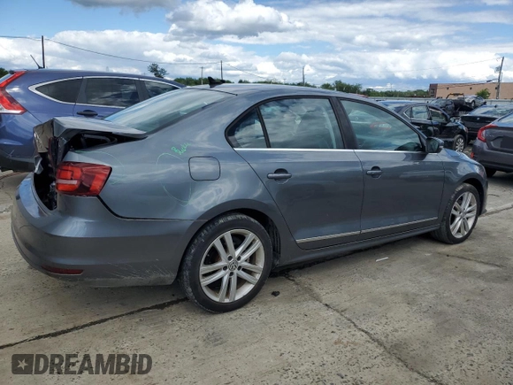 2017 Volkswagen Jetta SEL z VIN 3VWL17AJ6HM392174, wystawiony jako Copart lot #57771225 z przebiegiem 31 148 mil mil oraz Szkoda całkowita • Salvage title. Historia ofert i sprzedaży dostępna na DreamBid. Obrazek 3.