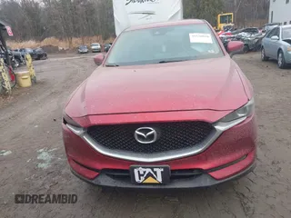 2017 Mazda CX-5 Touring with VIN JM3KFBCL9H0196693, listed as a IAAI auction lot 41136650 with 126,087 mi miles. Bid and sale history available at carsss.com. Image 12.