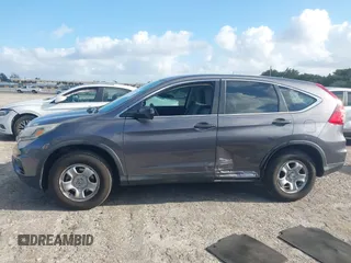 2015 Honda CR-V LX with VIN 2HKRM3H34FH510312, listed as a IAAI auction lot 41952816 with 111,712 mi miles and . Bid and sale history available at carsss.com. Image 15.
