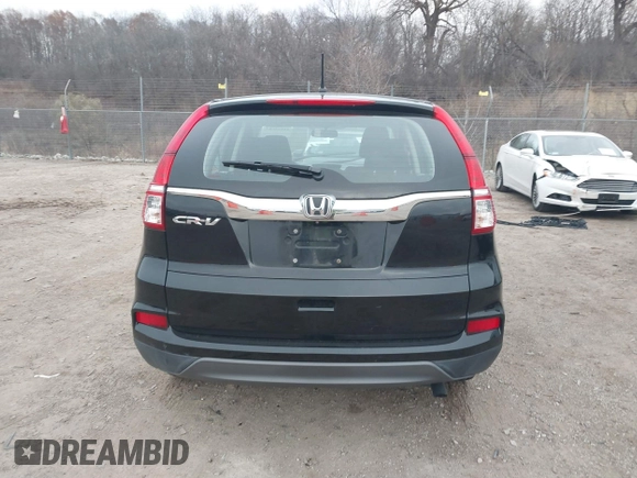 2015 Honda CR-V LX with VIN 2HKRM3H35FH501019, listed as a IAAI auction lot 41014683 with 111,168 mi miles and . Bid and sale history available at carsss.com. Image 16.
